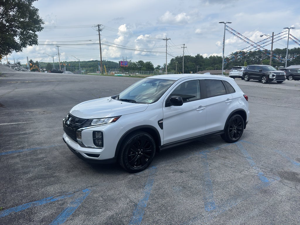 2026 Mitsubishi Outlander Sport LE in White Diamond — front three-quarter view