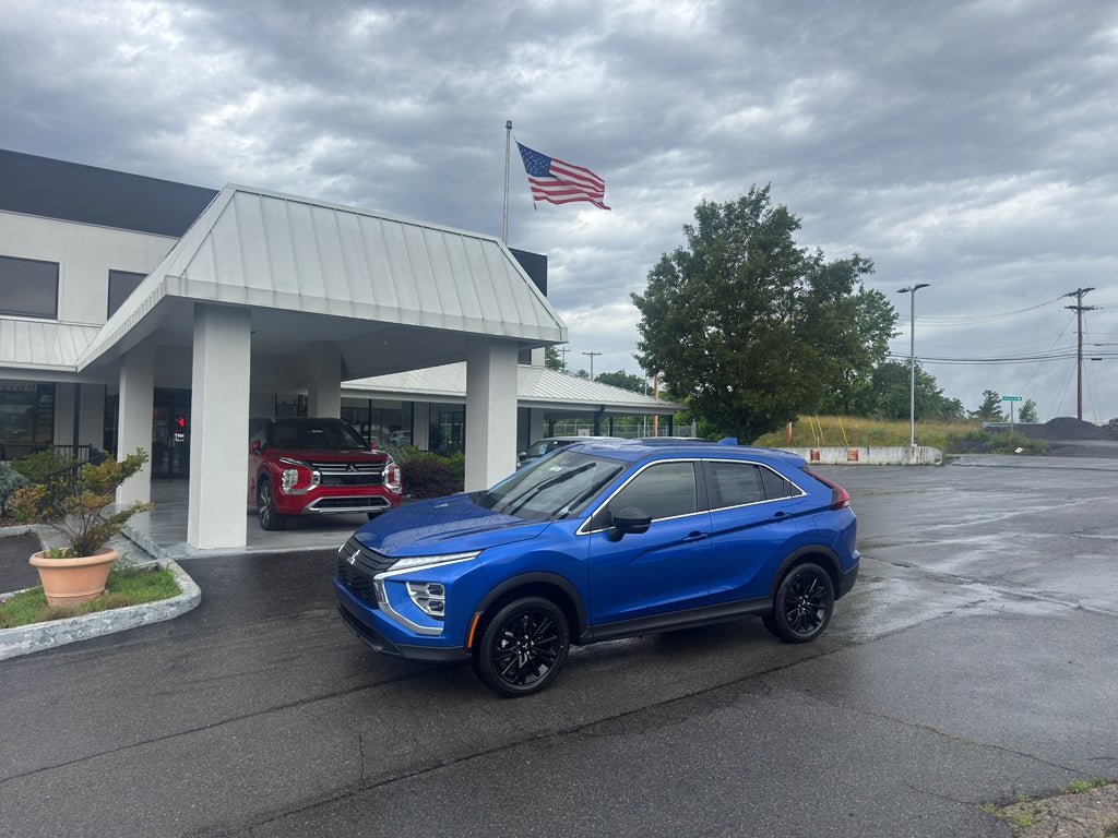2026 Mitsubishi Eclipse Cross LE in Lightning Blue Metallic — front three-quarter view